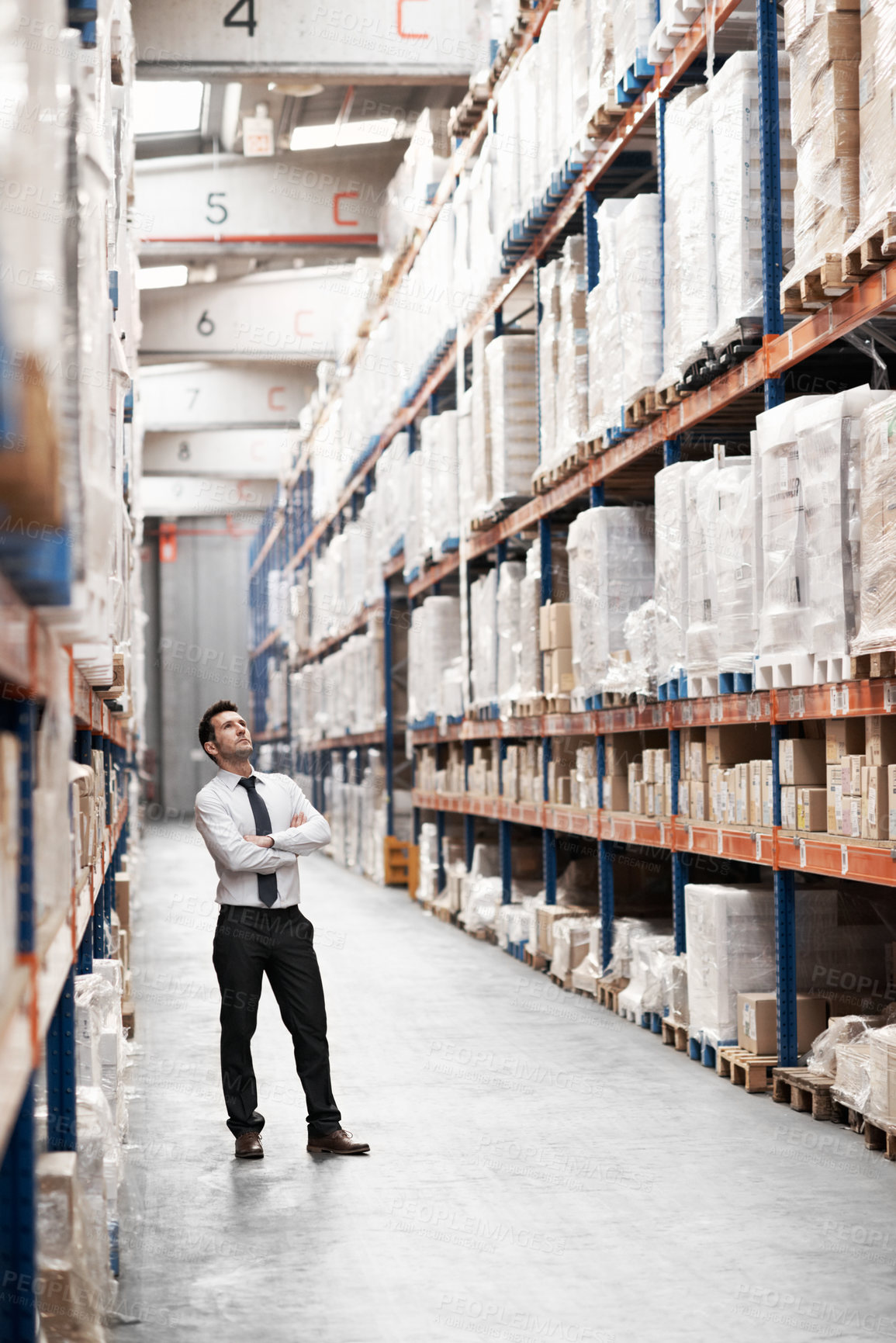 Buy stock photo Distribution, businessman and thinking in warehouse for logistics, inventory management and arms crossed. Person, ideas and corporate supply chain manager insight for export goods at shipping depot 
