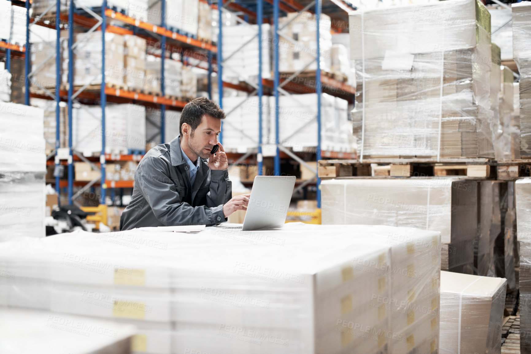 Buy stock photo Logistics, laptop or man with phone call in warehouse for inventory update, order status or export. Tech, dispatcher and contact courier to confirm route, parcel tracking and distribution service