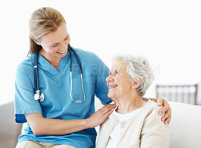 Buy stock photo Laugh, homecare and nurse with senior woman for medical checkup, empathy or rehabilitation with help. Support, healthcare and caregiver with elderly female patient in retirement with assistance.