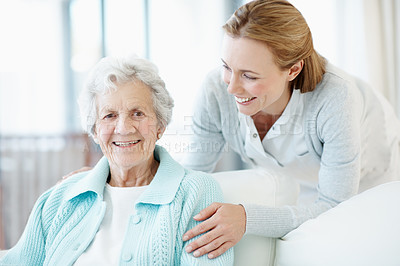 Buy stock photo Daughter, relax and old woman at house with smile, love and  connection for bonding together. Portrait, female person and senior mother with affection, compassion and elderly care for weekend break