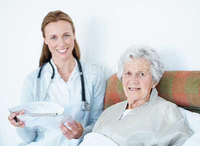 Buy stock photo Portrait, caregiver and old woman at house with clipboard, questions and checkup for advisory. Happy, nurse and senior person in bedroom with document, medical checklist and test results for wellness