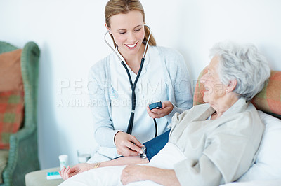 Buy stock photo Doctor, checkup and old woman in bed with blood pressure machine, healthcare and hypertension exam. Senior person, medical worker and stethoscope in nursing home with assessment, heart rate and help.