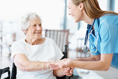 Buy stock photo Wheelchair, nurse and old woman holding hands for support, talk and healthcare or senior care. Caregiver, elderly patient or person with disability, wellness and happy in retirement at nursing home