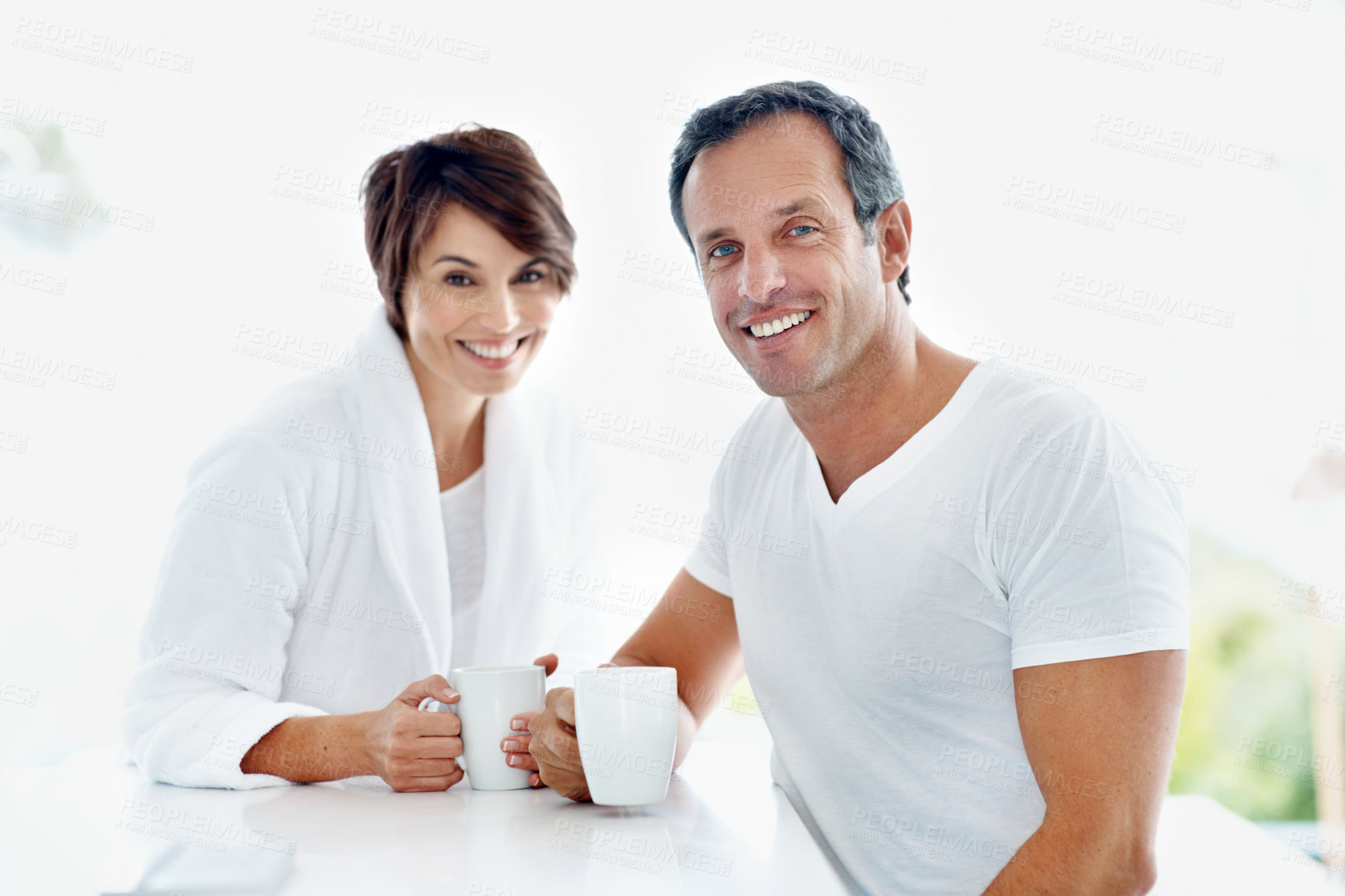 Buy stock photo Couple, portrait and smile in home with coffee for break, relax or morning start with drink. People, marriage and connection with beverage, happy and bonding for relationship and routine in house