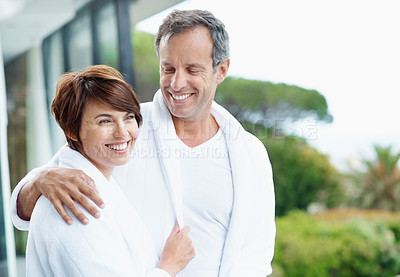 Buy stock photo Love, smile and balcony with couple at hotel for travel, anniversary getaway and bonding. Marriage, holiday villa and hospitality with man and woman relax at resort for view, space and support