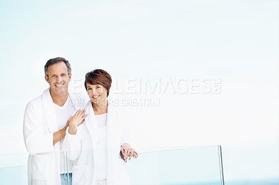 Buy stock photo Travel, portrait and balcony with couple at hotel for love, anniversary getaway and bonding. Marriage vacation, holiday villa and hospitality with mature man and woman for view, space and support