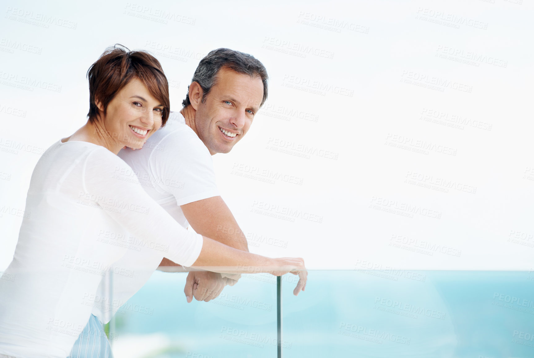 Buy stock photo Love, portrait and balcony with couple at hotel for travel, anniversary getaway and bonding. Marriage, holiday villa and hospitality with man and woman at resort for view, mockup space and support