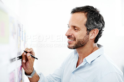 Buy stock photo Business man, writing and blueprint on board with review of layout, architecture and strategy analysis. Project, smile or architect with pen for floor plan, renovation overview and white background