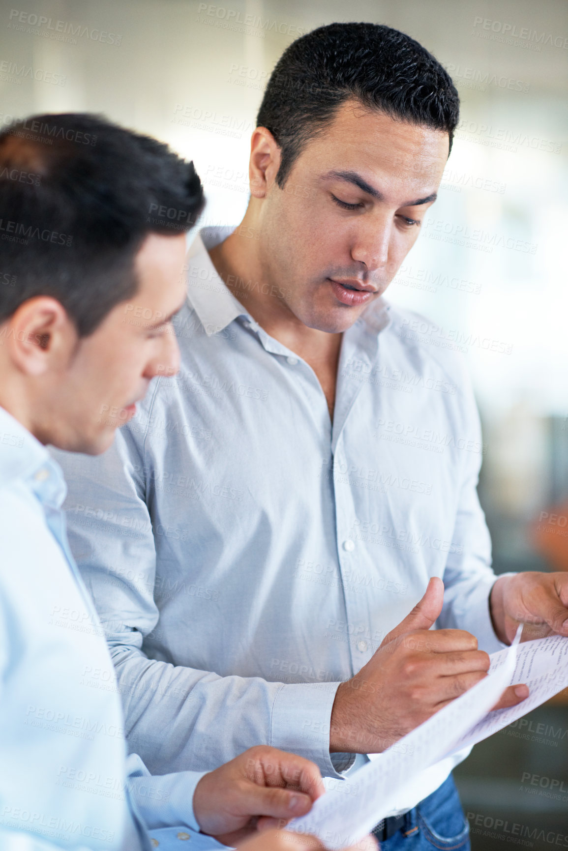 Buy stock photo Business, men and advice with paperwork in office for article feedback, story review and guidance. Team, lead editor or copywriter with documents for submission comments, writing tips or proofreading