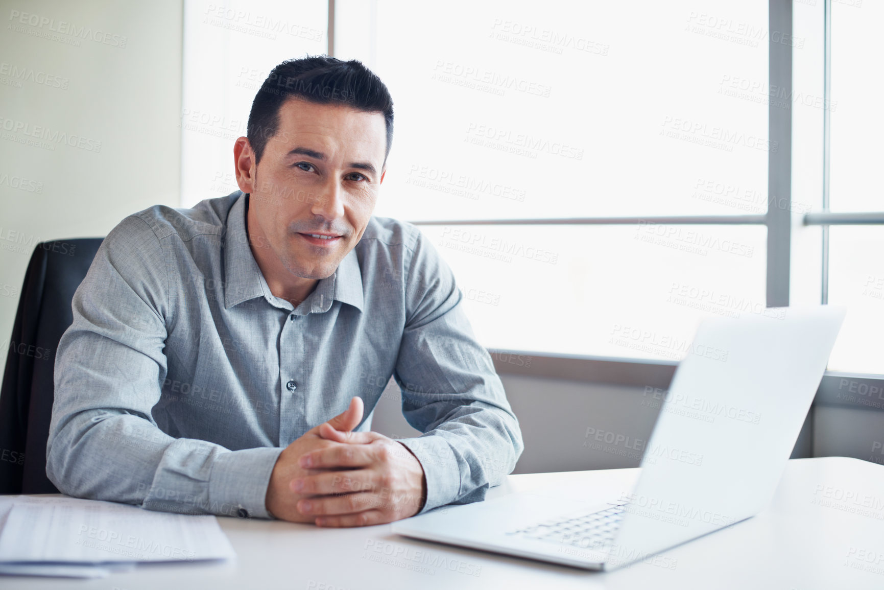 Buy stock photo Happy, man and laptop in office portrait for news production, creative experience or editorial work. Media, editor and tech in newsroom for current affairs, fact checking submission and credibility
