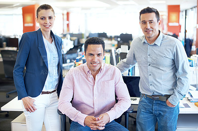 Buy stock photo Portrait of a three smiling coworkers in an office