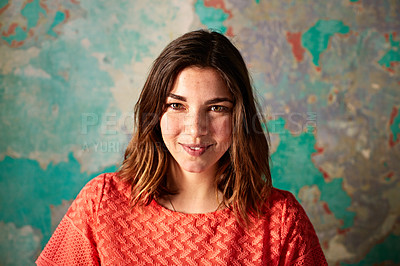Buy stock photo Portrait of a young woman posing in front of a map on a wall