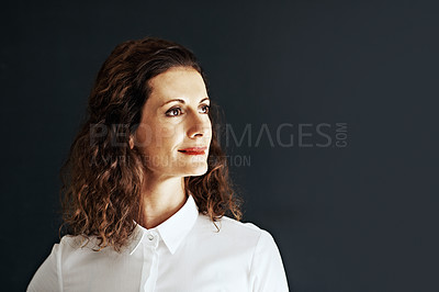 Buy stock photo Studio shot of a businesswoman against a gray background