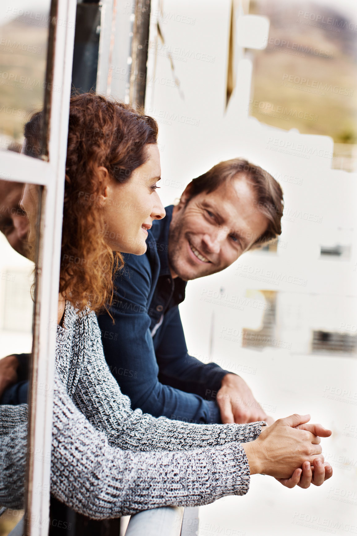 Buy stock photo Smile, thinking and balcony with couple in home for reflection, connection and bonding for future. Vision, perspective and marriage commitment with man and woman in house for love, happy and trust