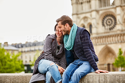 Buy stock photo Shot of a happy young couple enjoying a day together in Paris