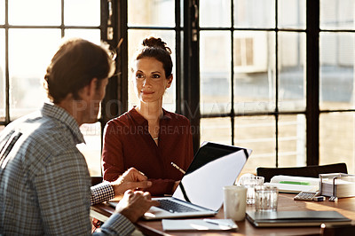 Buy stock photo Shot of a mature couple working together at home