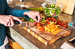 Carefully preparing her ingredients