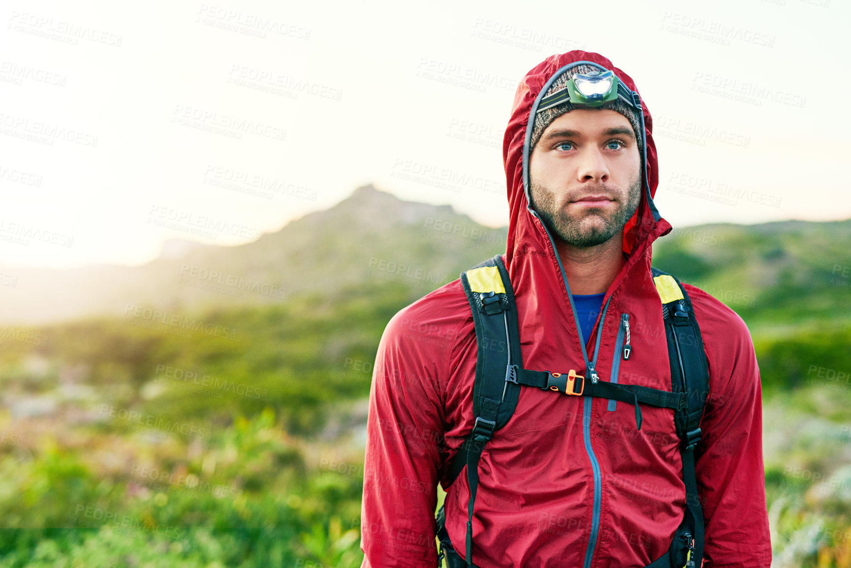 Buy stock photo Thinking, hiking and man with headlamp in nature for travel, hobby and backpacking for holiday. Trekking, eco tourism and person with outdoor gear on mountain for winter break, trip or vacation