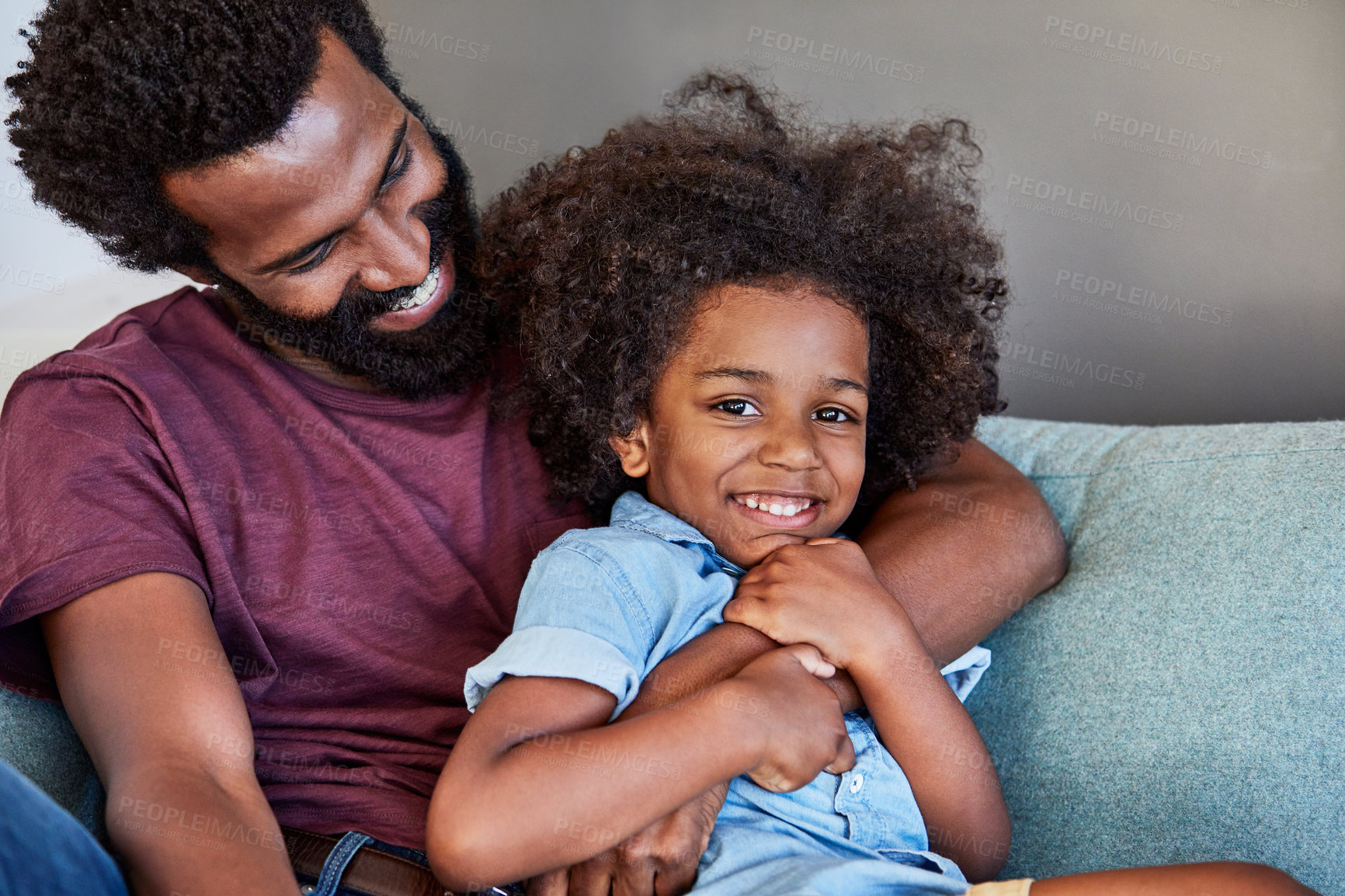 Buy stock photo Smile, love and father with son on sofa in home for bonding, connection and weekend break together. Relax, portrait and trust with black man and child in living room of family house for support
