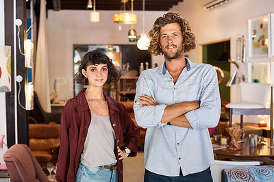 Buy stock photo Shot of two colleagues standing in a furniture store