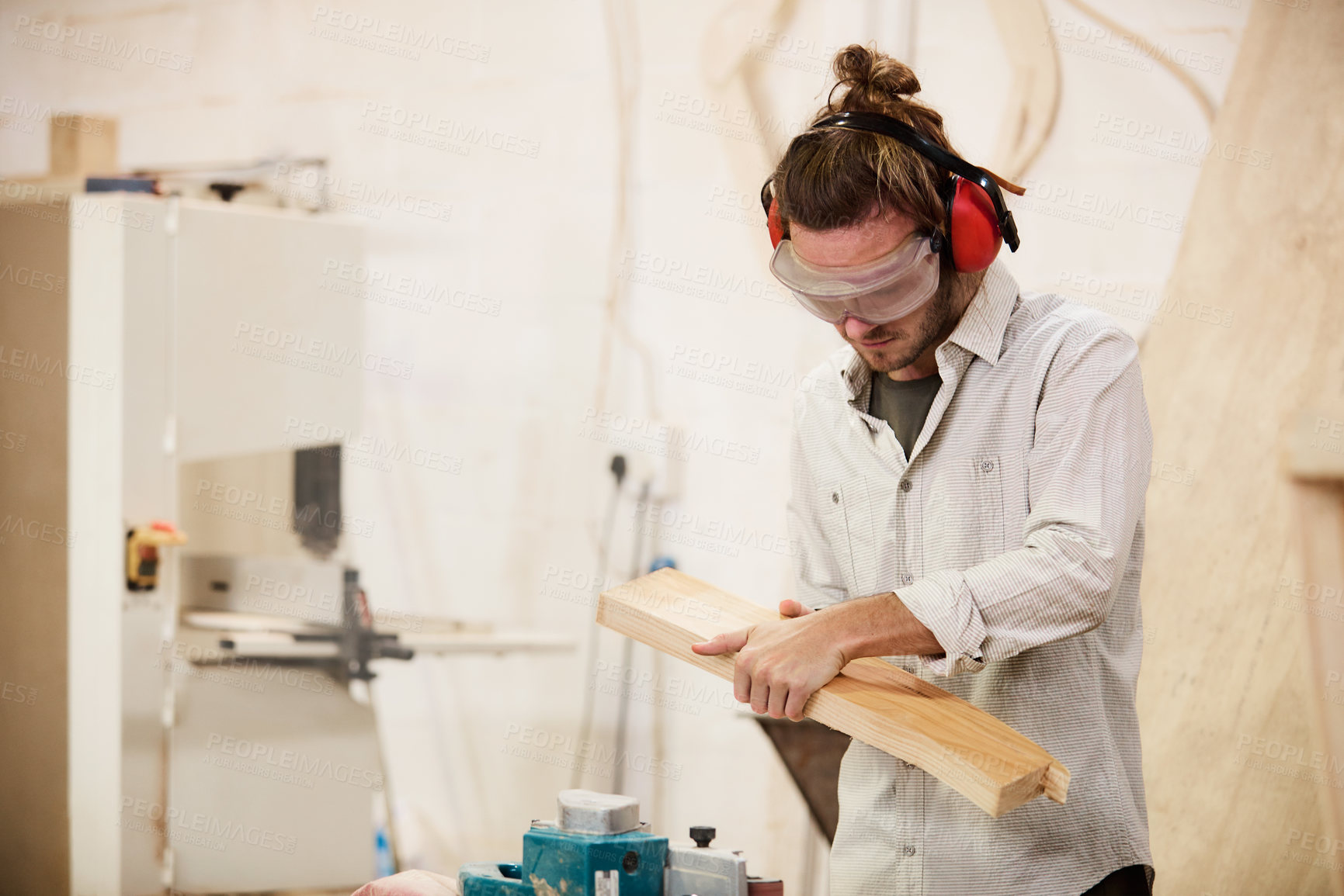 Buy stock photo Man, carpenter or plank in workshop for furniture crafting, wood production or development. Male person, artisan or timber designer with equipment or gear for carpentry or lumber project in warehouse