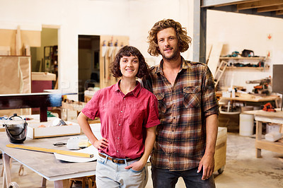 Buy stock photo Cropped shot of colleagues standing in a furniture manufacturing workshop