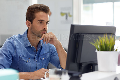 Buy stock photo Cropped shot of a businessman working on his computer