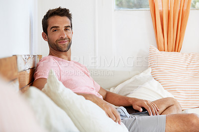 Buy stock photo Shot of a man in his home