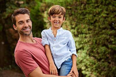 Buy stock photo Portrait of a young boy and his father bonding outdoors