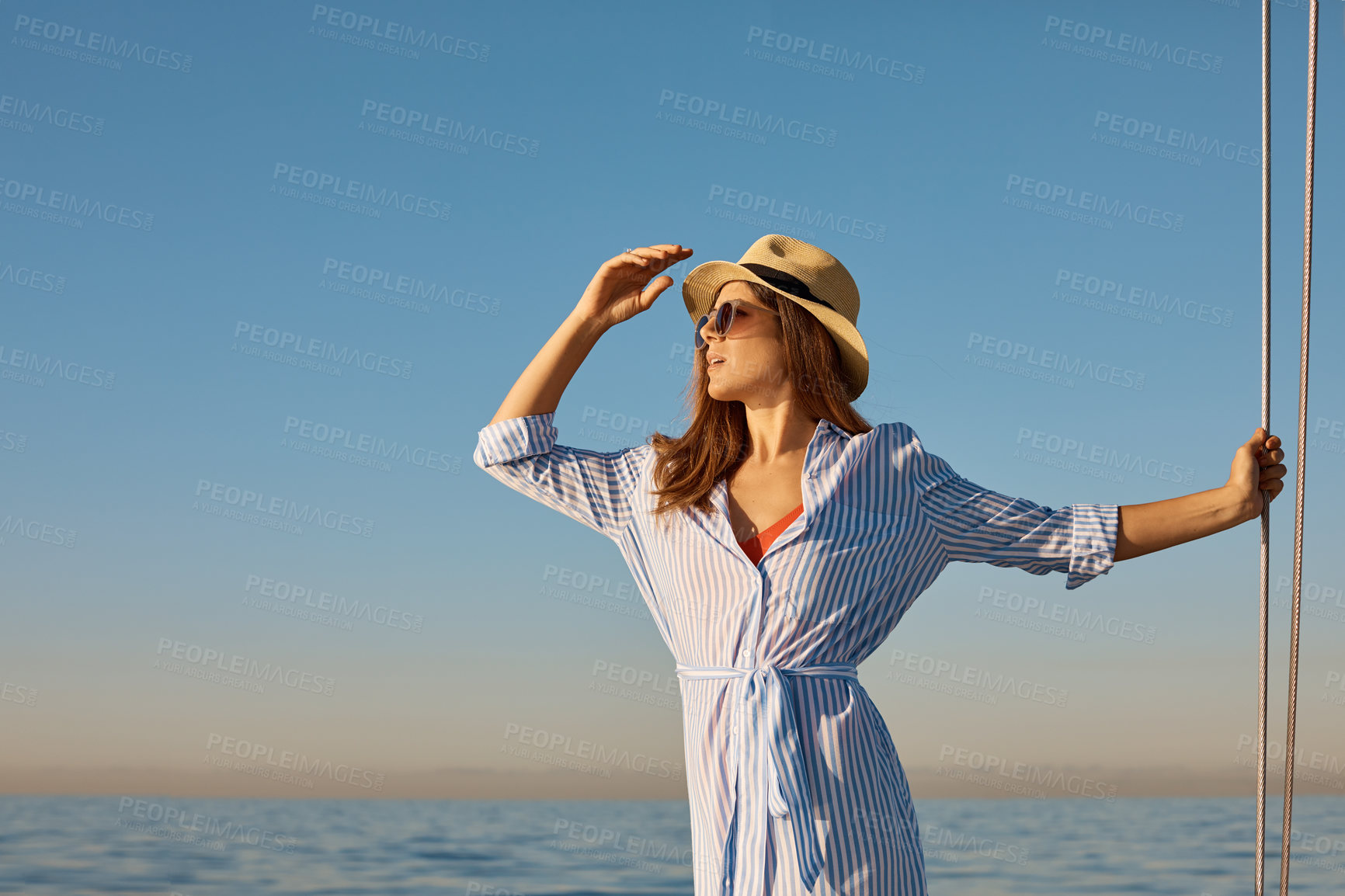 Buy stock photo Sunglasses, view and woman on yacht with space for holiday, ocean travel or vacation in evening. Horizon, shades and voyage with person on boat at sea for adventure, journey or luxury getaway