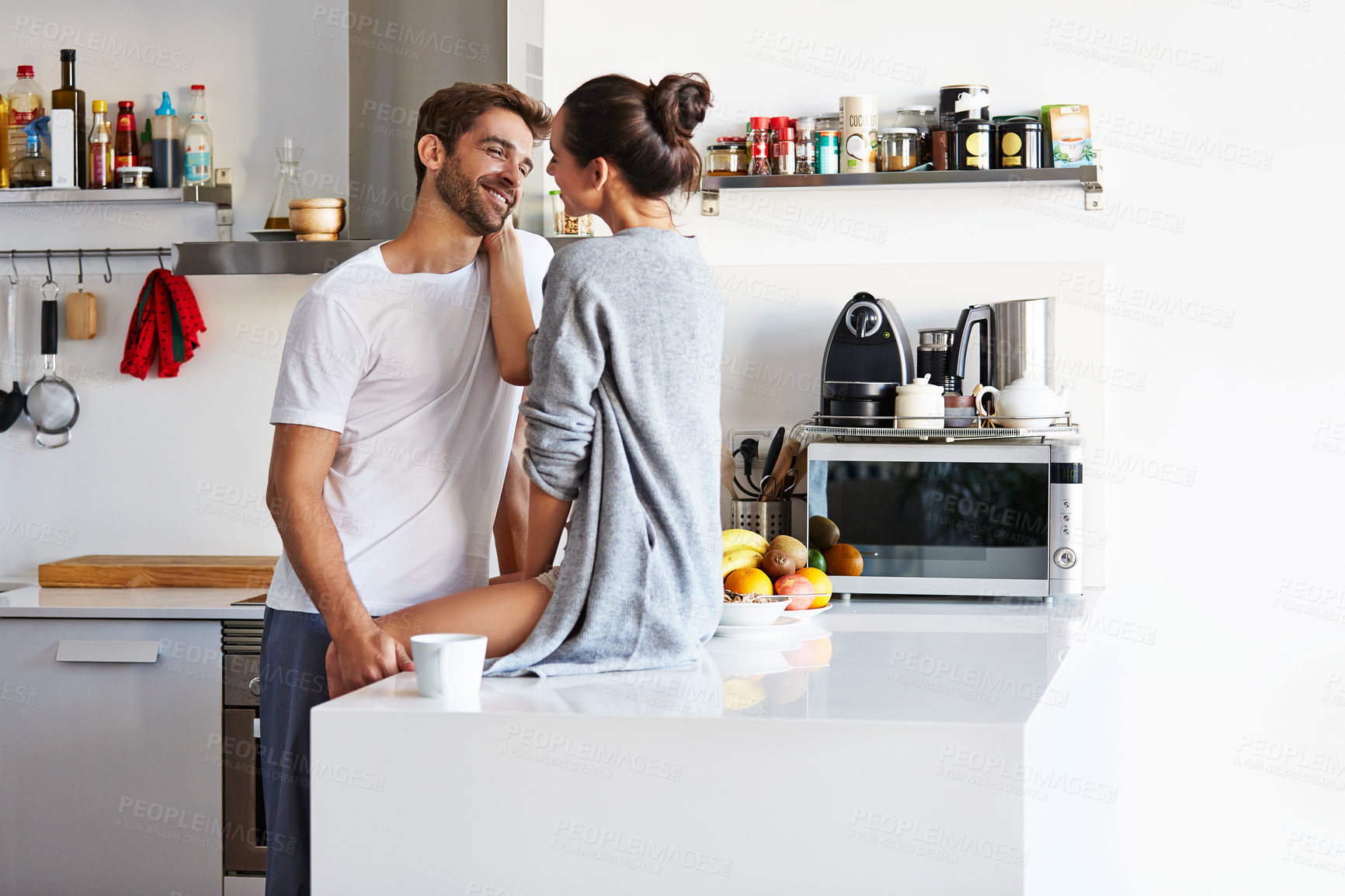 Buy stock photo Morning, smile or couple in kitchen with love, bonding together or chill moment on weekend break. Happy, relax and people in house with affection, tender partner or day off in romantic relationship.