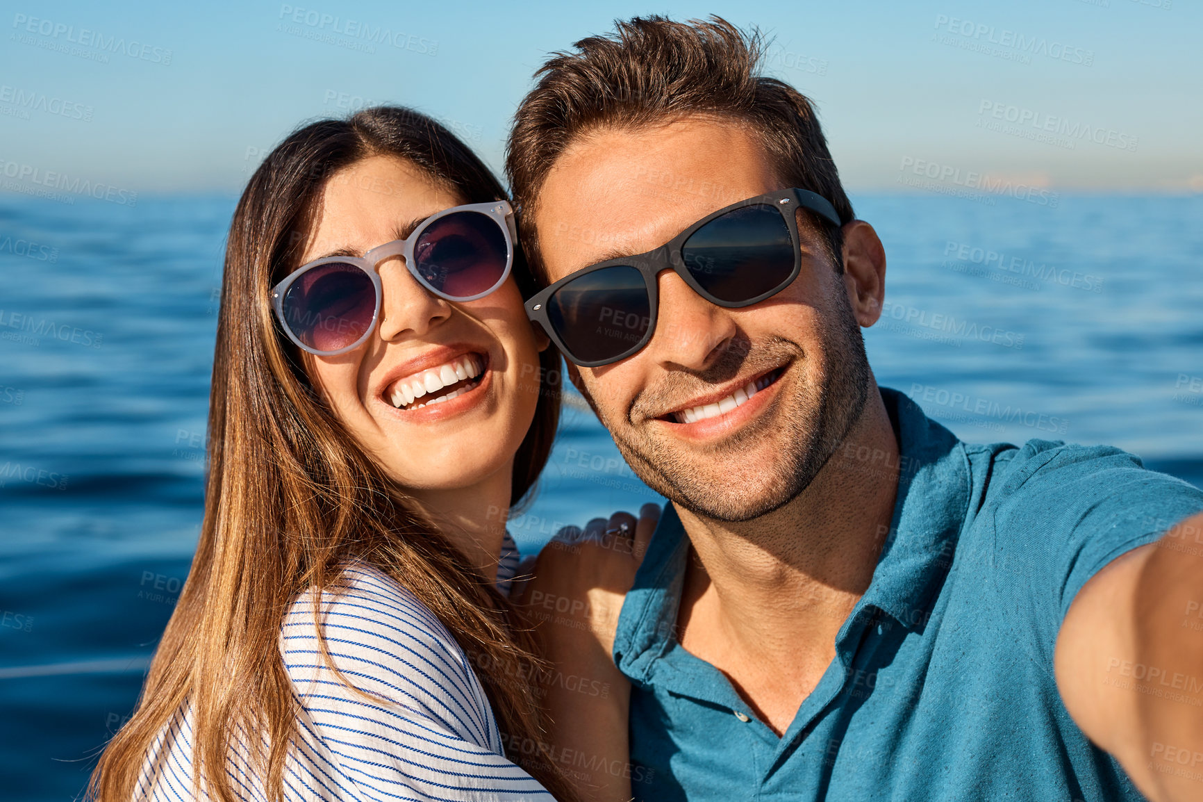 Buy stock photo Smile, selfie and portrait of couple on cruise for summer, social media post or picture pov. Vacation photography, seaside vlogger and memory with man and woman outdoor for honeymoon, travel and date