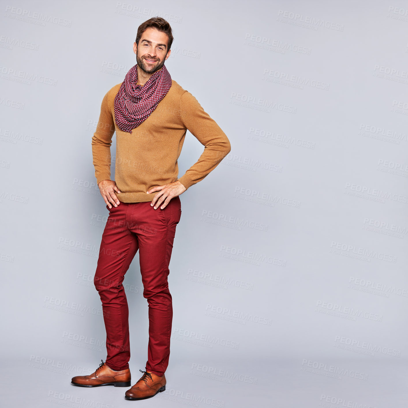 Buy stock photo Smile, man and confidence with fashion in studio, minimal style and menswear on white background. Portrait, happy person and trendy clothes, infinity scarf and smart casual outfit with mockup space