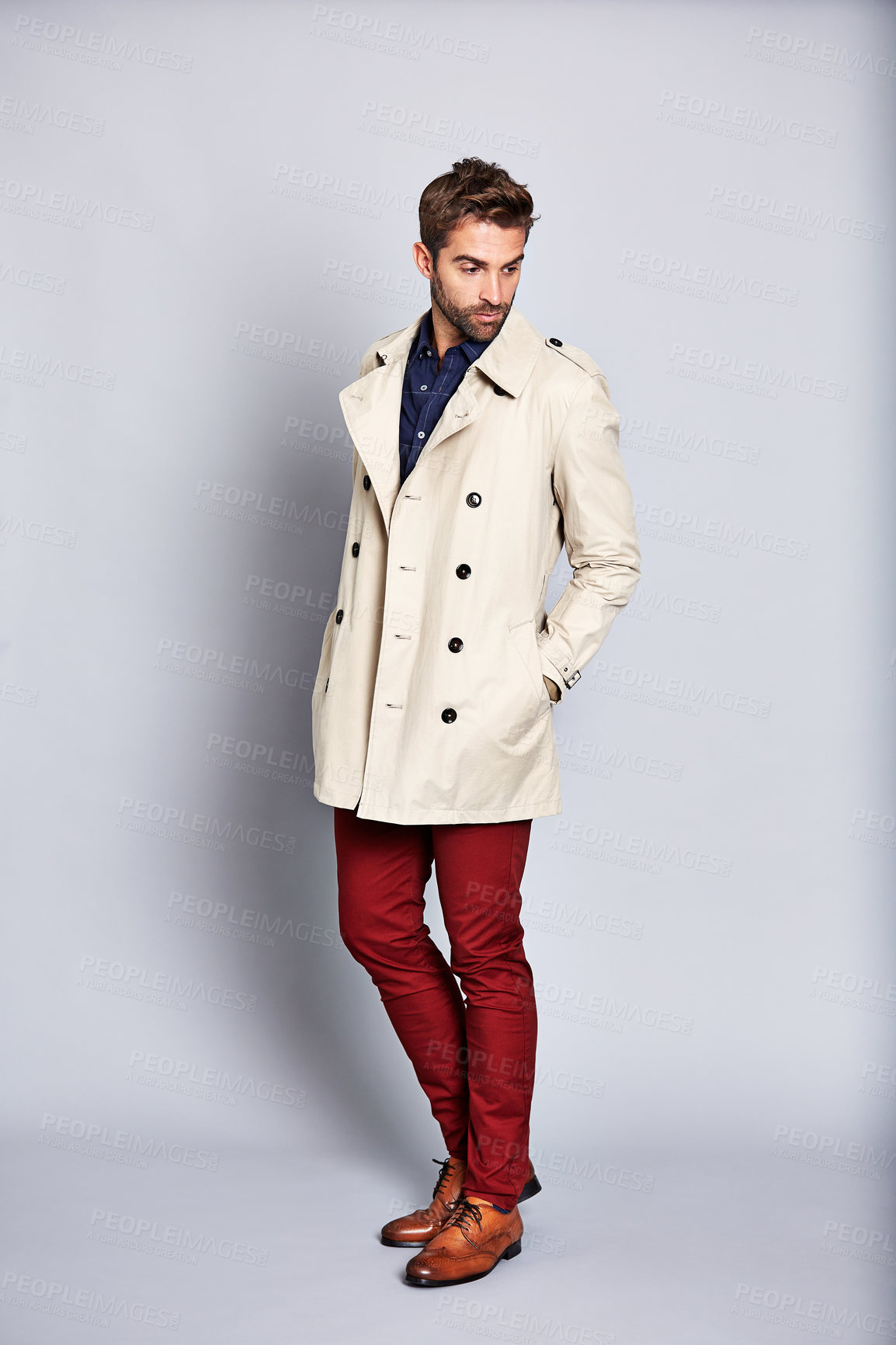 Buy stock photo Man, thinking and fashion in studio with trench coat, contemplation and vision for trendy aesthetic. Confident, male person and reflection with jacket, stylish clothes and outfit on white background.