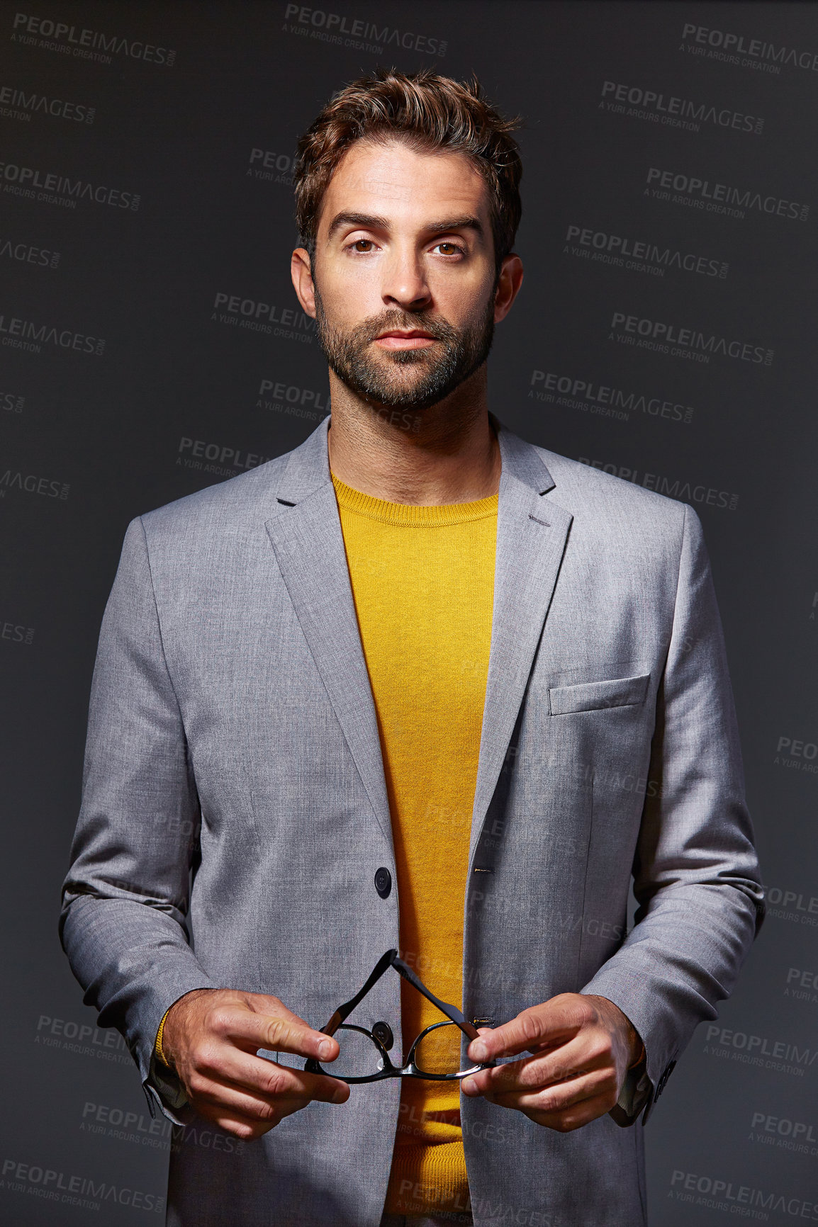 Buy stock photo Serious, man and lawyer in studio with portrait, career pride and about us for legal proceedings. Male person, attorney or confident with glasses, representative and justice advice on gray background