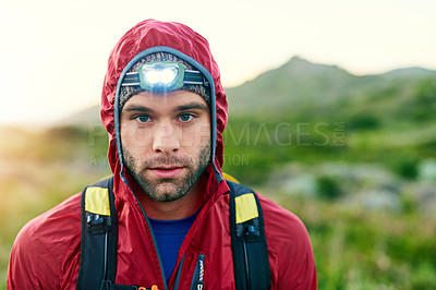 Buy stock photo Cropped portrait of a handsome young male athlete out for a morning run