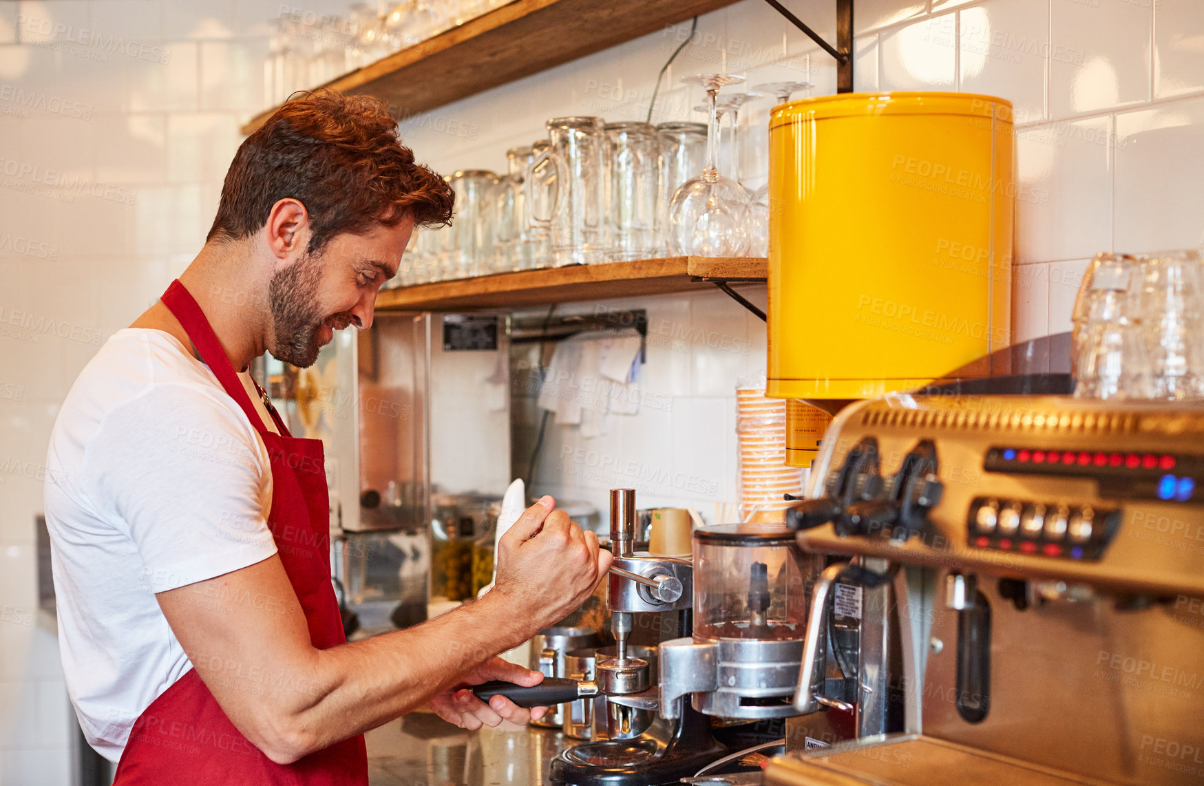 Buy stock photo Machine, happy and man in coffee shop to prepare cappuccino, espresso and caffeine beverage. Hospitality, restaurant and person with customer order for drink, latte and barista service in cafeteria