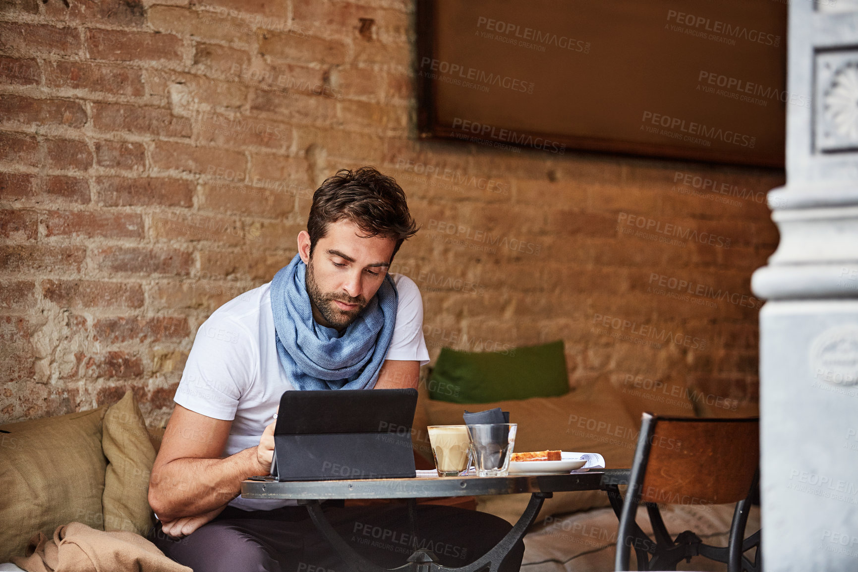Buy stock photo Freelancer, lunch and man with tablet in coffee shop, paid advertising and content strategy on web. Digital marketing, remote work and person with food, online and research with technology in cafe