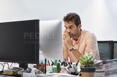 Buy stock photo Cropped shot of a young businessman working on his computer