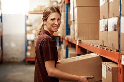 Buy stock photo Portrait of a young woman working in a warehouse