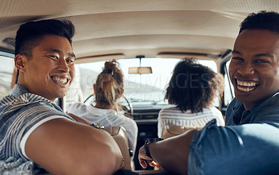Buy stock photo Shot of a group of happy young friends going on a road trip together