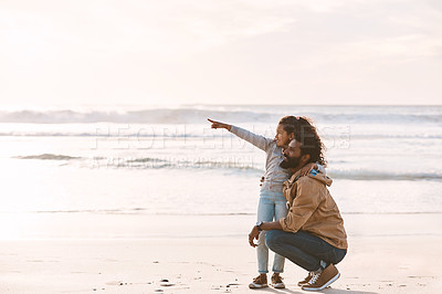 Buy stock photo Shot of an adorable little girl having a fun day at the beach with her father