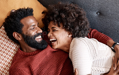 Buy stock photo Cropped shot of an affectionate couple relaxing on the sofa at home