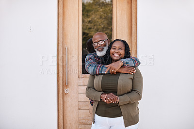 Buy stock photo Portrait of a mature couple standing outside their home