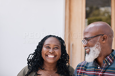 Buy stock photo Portrait of a mature woman standing alongside her husband outside their home
