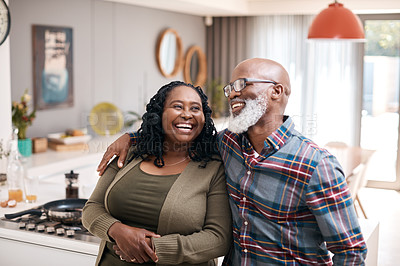 Buy stock photo Shot of a mature couple spending quality time together at home