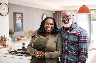 Buy stock photo Portrait of a mature couple spending quality time together at home