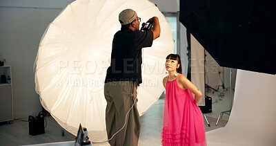 Buy stock photo Photographer, model and fashion photoshoot on studio with camera, trendy clothes and magazine campaign. People, cameraman and photography on set with gear, stylish outfit and creative media project.