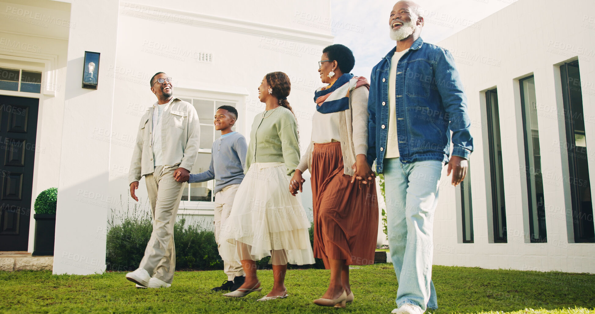 Buy stock photo Family, walk and holding hands in backyard at new house, relocation and investment for real estate. Black people, generations and child outdoor at dream home, property purchase and loan achievement