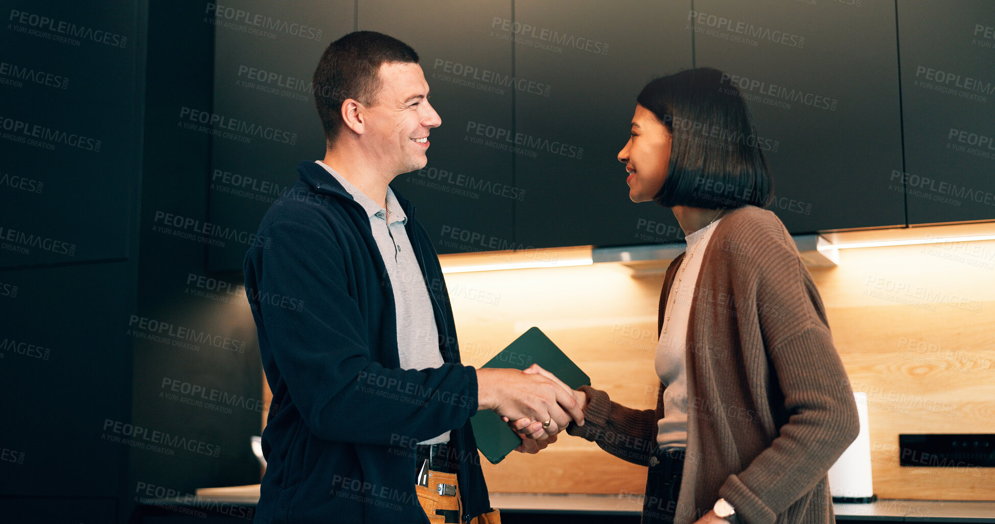 Buy stock photo Handshake, client and tablet with plumber in kitchen for invoice agreement, repair plan or handyman. Plumbing solution, home renovation quote or shaking hands with people for technology and feedback
